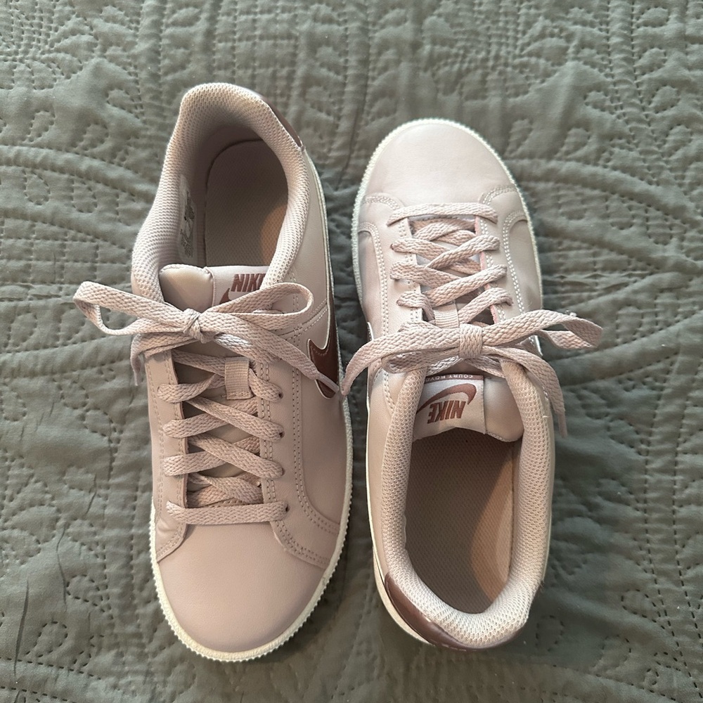 Nike rose colored sneakers. Size 7